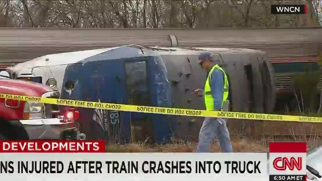 Video shows train crash into semi truck - CNN Video