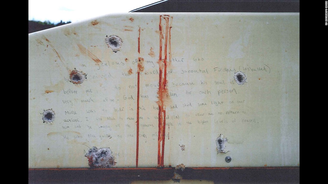 Prosecutors showed the jury photos of what they say are Tsarnaev&#39;s writings inside the boat he was captured in.