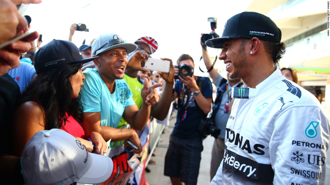 &quot;The reason Lewis is so popular is because he spends a lot of time on social media, he reaches out to his fans and he wears his heart on his sleeve,&quot; says Hamilton fan Christopher Thomas, seen talking to his hero at the 2014 U.S. Grand Prix.