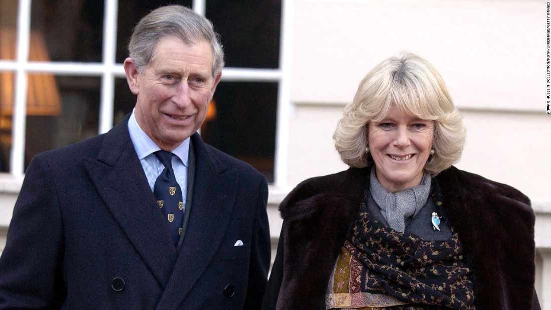 Charles and Camilla walk together in February 2003.