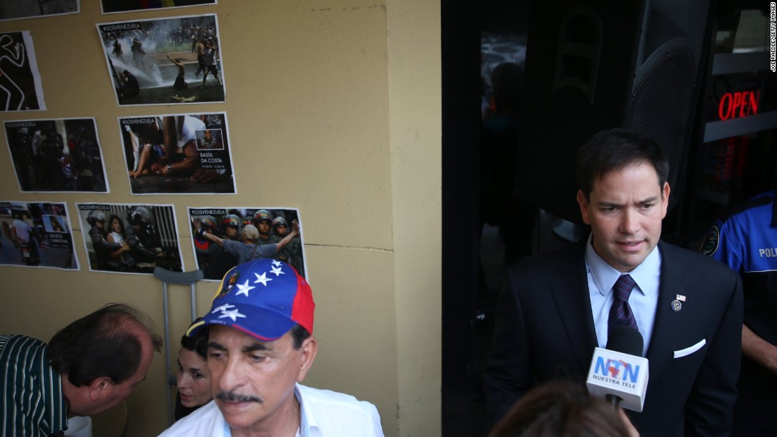 Rubio speaks to the media at the Doral restaurant in April 2014.