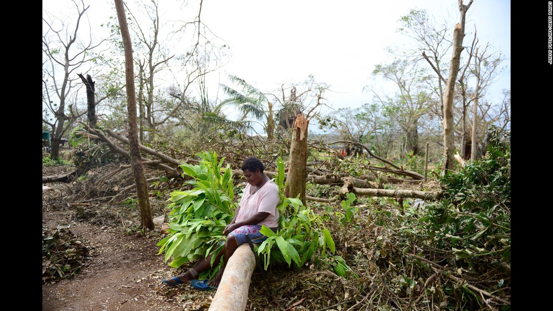 A woman sits on a fallen tree among what&#39;s left of her garden in Port Vila, Vanuatu, on Thursday, March 19, nearly a week after Cyclone Pam ripped through the island nation in the South Pacific. &lt;a href=&quot;http://www.cnn.com/2015/03/17/asia/cyclone-pam-vanuatu/&quot;&gt;Vanuatu President Baldwin Lonsdale has called the storm a &quot;monster,&quot;&lt;/a&gt; saying it has set back the development of his country, already one of the poorest in the region, by years. 