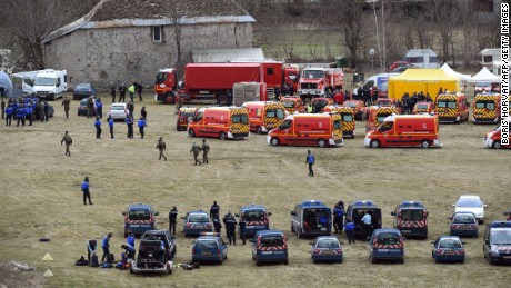 Emergency workers and members of the French Gendarmerie gather on March 24 in Seyne, France, near the site where the plane crashed.