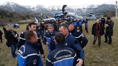Rescue workers and members of the French Gendarmerie gather in Seyne, France, on Tuesday, March 24, as search-and-rescue teams struggle to reach the remote crash site of Germanwings Flight 9525.
