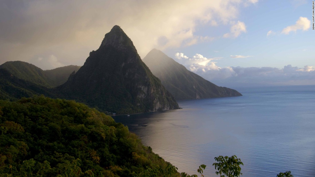 Saint Lucia stretches 27 miles long in the Caribbean Sea.&lt;a href=&quot;http://ireport.cnn.com/docs/DOC-1220562&quot;&gt; iReporter Dennis Licht &lt;/a&gt;enjoyed &quot;the gorgeous scenery, the lush vegetation and watching the storms roll over the Pitons, as this picture illustrates.&quot;