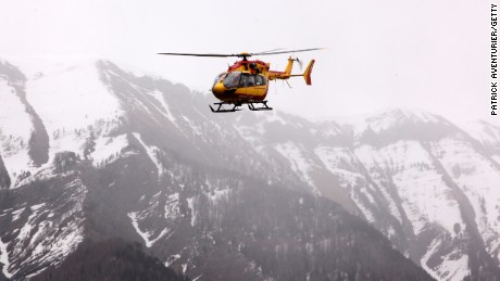 Gendarmerie and French mountain rescue teams arrive near the site of the Germanwings plane crash near the French Alps on March 24, 2015