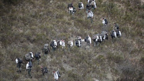 SEYNE, FRANCE - MARCH 25: French military personel walk up the mountainside on March 25, 2015 near Seyne, France. Germanwings flight 4U9525 from Barcelona to Duesseldorf has crashed in Southern French Alps. All 150 passengers and crew are thought to have died. (Photo by Peter Macdiarmid/Getty Images) *** BESTPIX ***