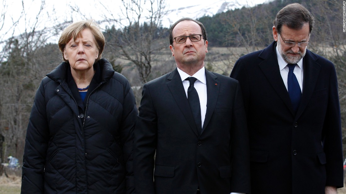 From left, German Chancellor Angela Merkel, French President Francois Hollande and Spanish Prime Minister Mariano Rajoy pay respect to victims at the crash site on March 25.