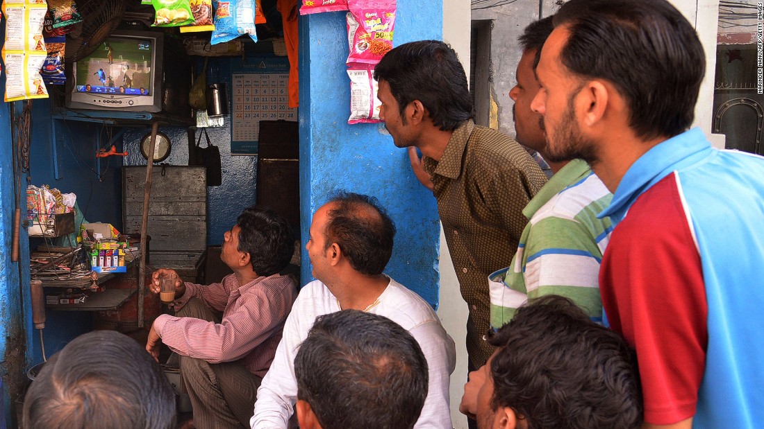 But it wasn&#39;t all happy viewing for India&#39;s legions of fans -- pictured here watching the live broadcast at a tea stall in the Indian town of Amritsar. 