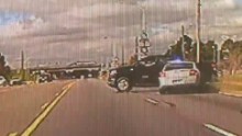 Cop Shot Point Blank In The Back - CNN Video