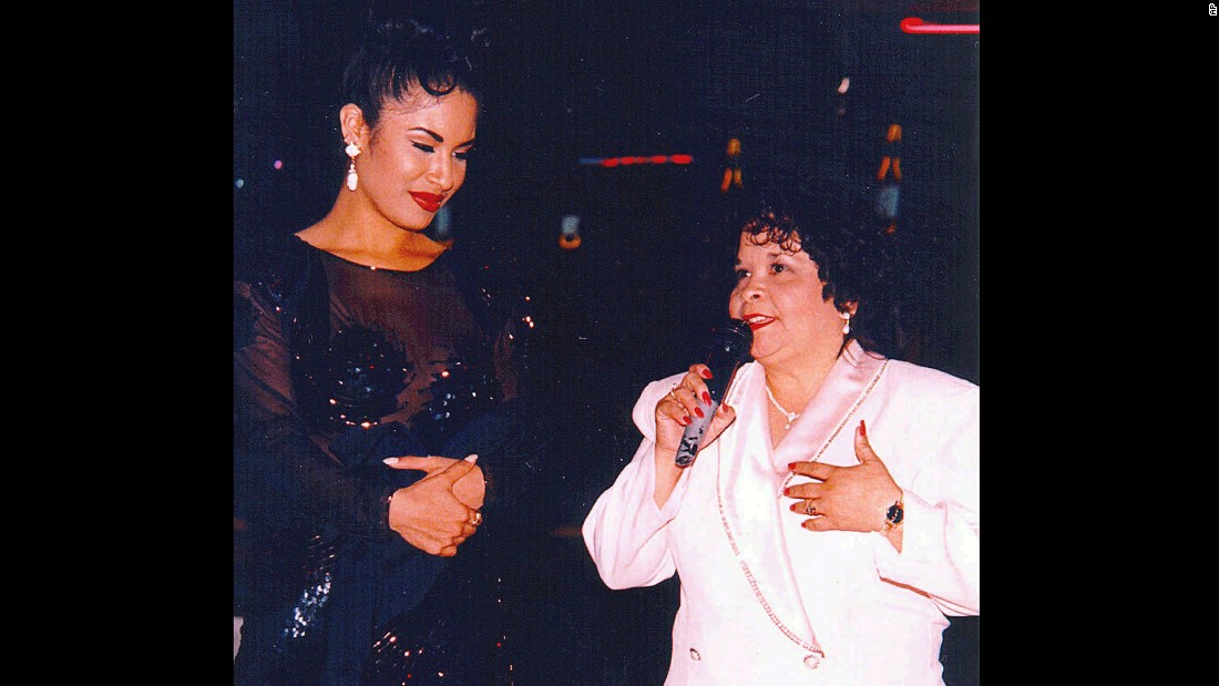 Selena stood by as her fan club president, Yolanda Saldivar, spoke at a 1994 Tejano Music Awards party in San Antonio, Texas. Saldivar was later convicted of first-degree murder for shooting and killing Selena in a Corpus Christi motel room on March 31, 1995.