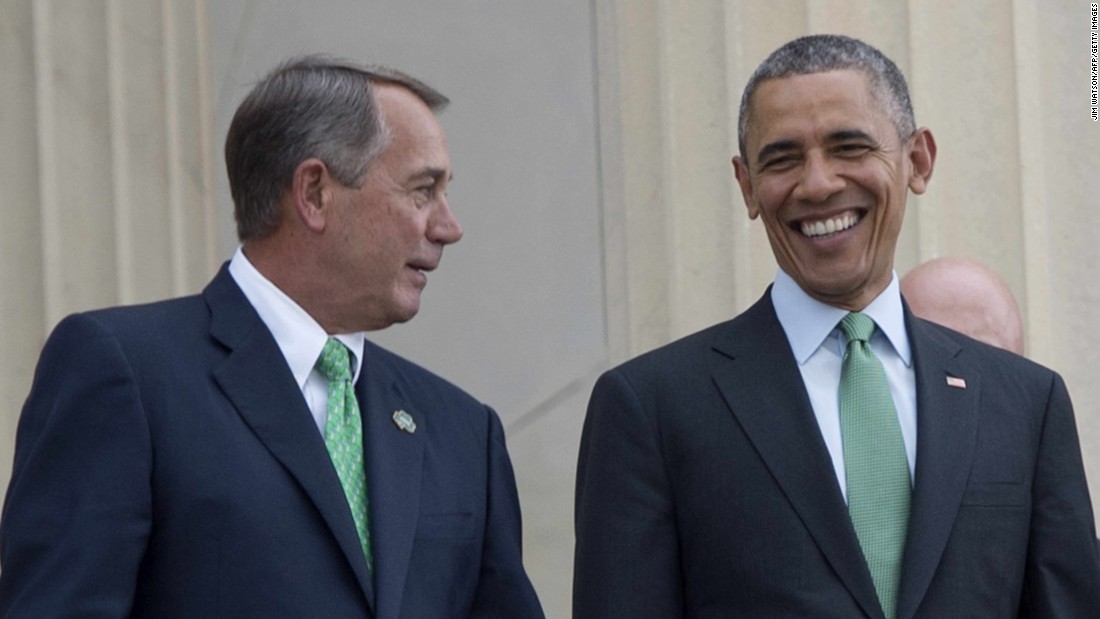 U.S. President Barack Obama walks with Speaker of the House John Boehner as they depart the annual Friend&#39;s of Ireland luncheon on Capitol Hill in Washington on March 17.