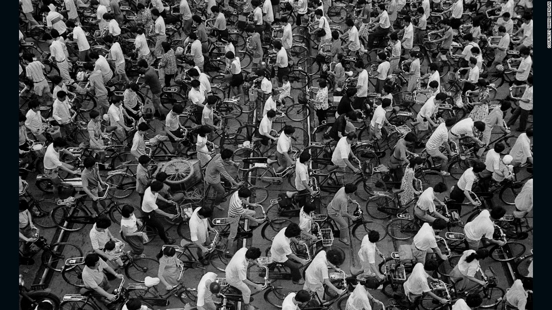 Cyclists pedal on Guangxin Road, Shanghai in 1991.&lt;strong&gt; &lt;/strong&gt;Wang Wenlan&#39;s most famous series of photographs of bicycles tracks China&#39;s relationship with the bicycle -- the most common means of transport in the 1980s and early 1990s.