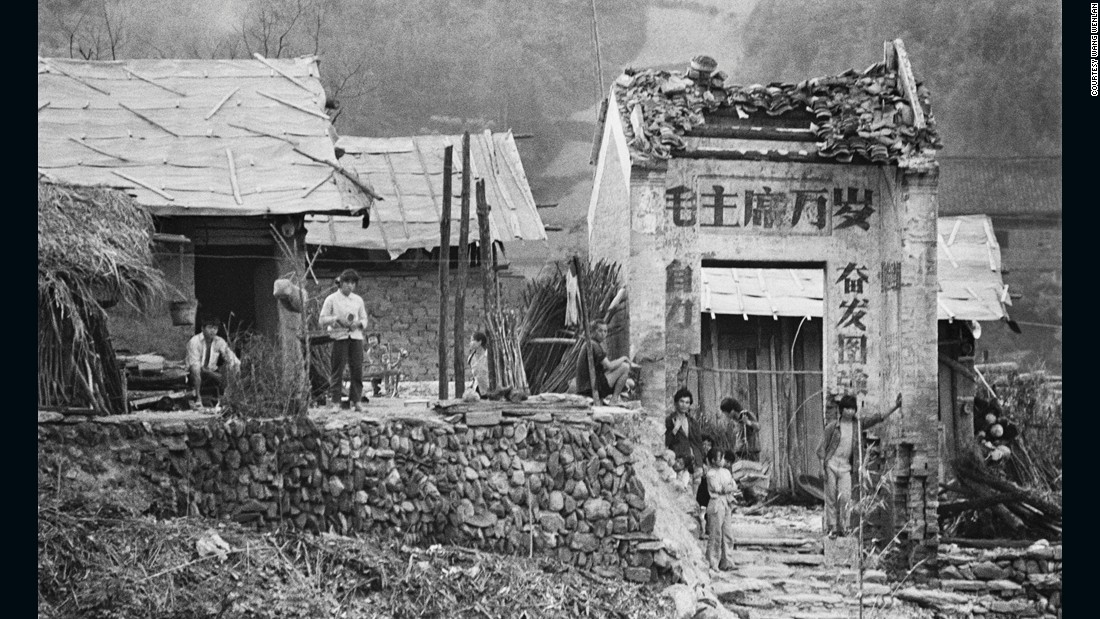 The village of Sanjiang, Guangxi photographed in 1988. The characters on the village gate read &quot;Long live Chairman Mao&quot; -- the most common political slogan during the Cultural Revolution. 