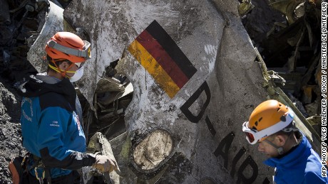 Gendarmes and rescuers from the Gendarmerie High-Mountain Rescue Group working at the crash site of the Germanwings Airbus A320 near Le Vernet, French Alps.