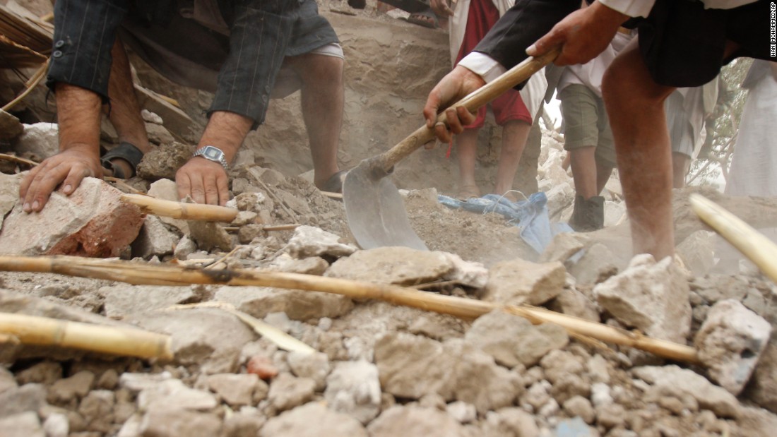 Yemenis search for survivors in the rubble of houses destroyed by Saudi-led airstrikes on April 4 in a village near Sanaa.