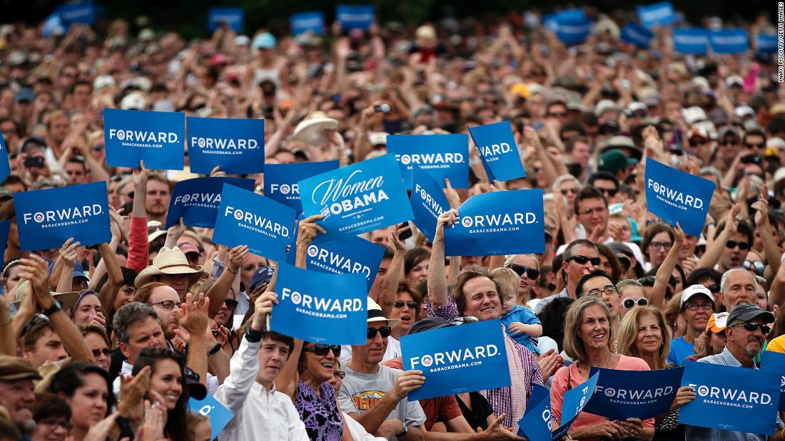 Supporters wave &quot;Forward&quot; signs as President Barack Obama speaks at a rally on September 2, 2012, in Boulder, Colorado.
