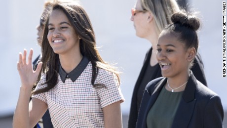 Malia and Sasha Obama arrive prior to their father, President Barack Obama, at the Edmund Pettus Bridge on March 7, 2015, in Selma, Alabama. The Obamas were in Alabama to commemorate the 50th anniversary of Bloody Sunday, when voting rights marchers attempting to walk to the Alabama capitol clashed with police.