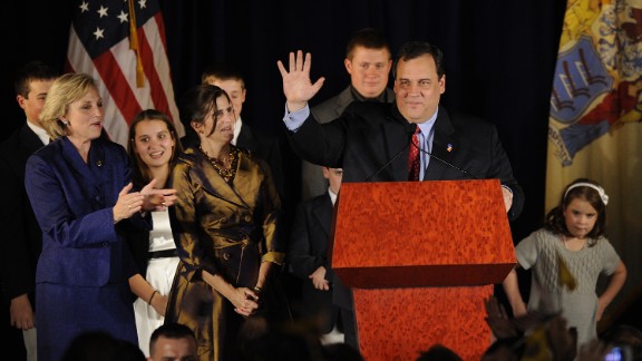 Christie waves to supporters with Lt. Gov.-elect Kim Guadagno, left, on November 3, 2009, in Parsippany, New Jersey. Christie defeated incumbent Democrat Jon Corzine.