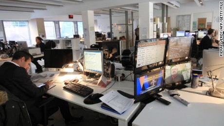 File photo: Journalists work in the editorial offices at France&#39;s TV5 Monde headquarters on February 7, 2012 in Paris. 