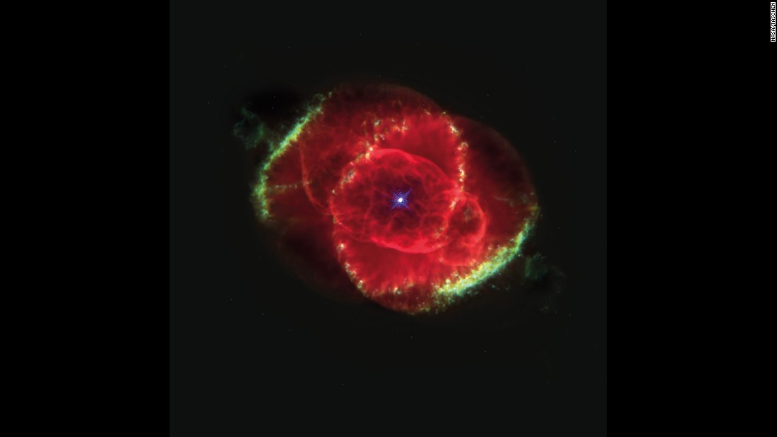 The Cat&#39;s Eye Nebula is a bunch of glowing gases kicked out into space by a dying star. This Hubble Space Telescope image shows details of structures including jets of high-speed gas and unusual knots of gas. This color picture is a composite of three images taken at different wavelengths. The nebula is estimated to be 1,000 years old. It&#39;s about 3,000 light years from Earth in the constellation Draco.