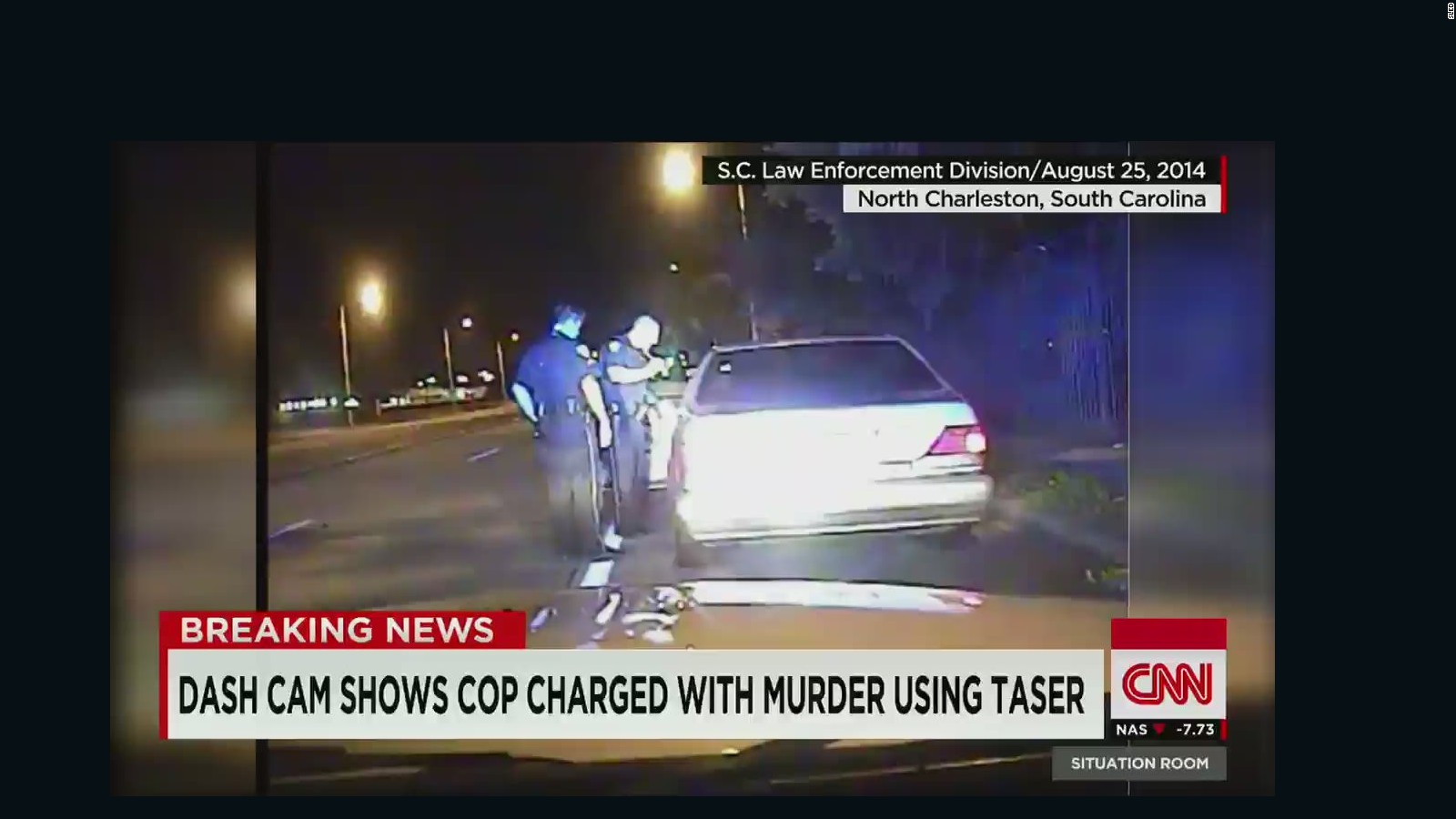 Cop Shot Point Blank In The Back - CNN Video