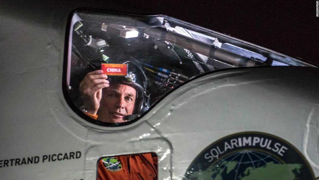 Piccard sits in the cockpit right after landing in Chongqing, China, on Sunday, March 31. He had just completed the fifth leg of the global trip.