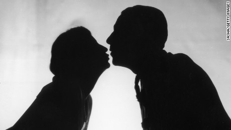 1st October 1926: A couple kissing in a scene from the play &#39;Just A Kiss&#39; at the Shaftesbury Theatre, London