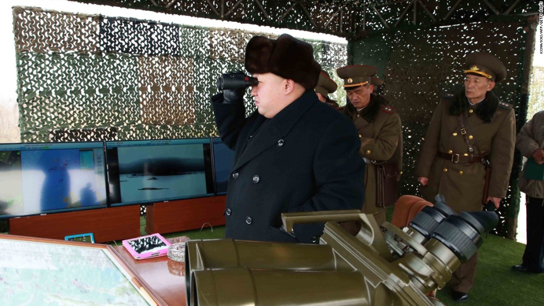 Kim inspects a drill for seizing an island at an undisclosed location in North Korea in an undated picture released by North Korea&#39;s official Korean Central News Agency on February 21.