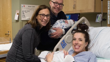Nikki and Matt Cobleigh with their children, Kai and Lilly, and surrogate Angela Haymond.