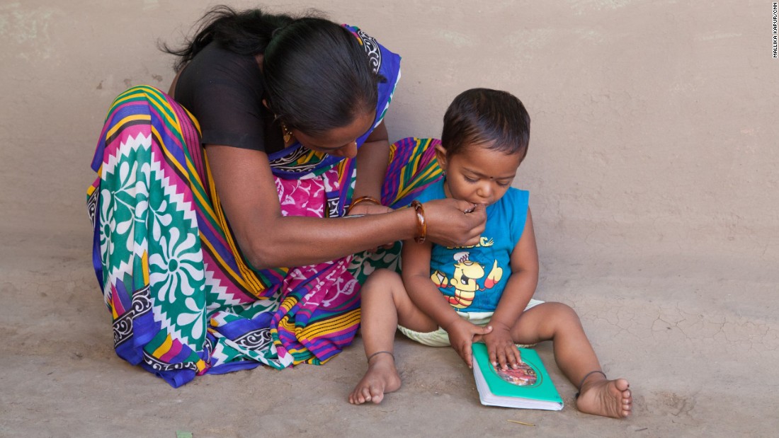 Yogita Kanhaiya feeds her son. He has no idea where his father has gone. She had imagined a very different future for herself and her young family.