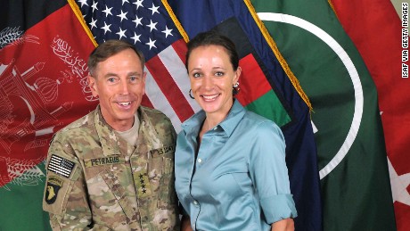 In this handout image provided by the International Security Assistance Force (ISAF), former Commander of International Security Assistance Force and U.S. Forces-Afghanistan; CIA Director Gen. Davis Petraeus, left, shakes hands with biographer Paula Broadwell, co-author of &#39;All In: The Education of General David Petraeus&#39; on July 13, 2011.