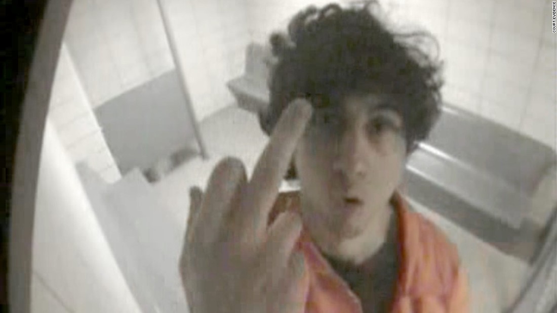 Tsarnaev &quot;flips the bird&quot; in a jail cell during his first arraignment on July 10, 2013. The image was presented to jurors in the sentencing phase of his trial.