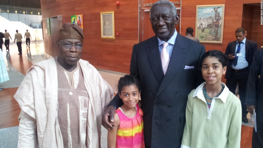She is pictured here with her younger sister and former Nigerian president Olusegun Obasanjo (left) and ec-Ghanaian president John Kufuor (right).