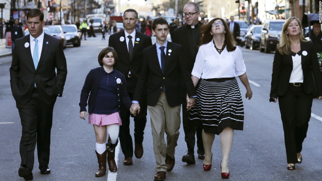 &lt;strong&gt;Jane Richard&lt;/strong&gt;, in the pink skirt, lost her leg. She holds the hand of her brother Henry as they walk down Boylston Street with their parents and others after an April 15 ceremony this year. She was standing next to her brother Martin behind a metal barricade when the second bomb went off. Her father, Bill, took one look at Martin, knew he wouldn&#39;t make it and focused his efforts on saving Jane. She sang in April at Fenway Park on opening day. 