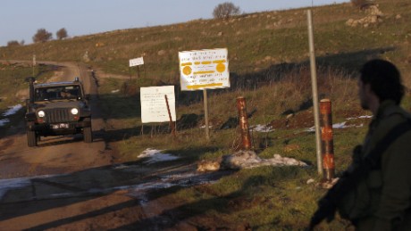 File: Israeli troops patrol the Israeli-occupied sector of the Golan Heights on January 18, 2015. 