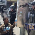 Baltimore boy offers officer water