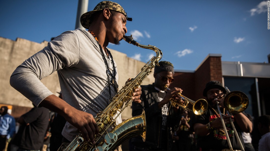 A band plays music during protests on April 28 in Baltimore. 