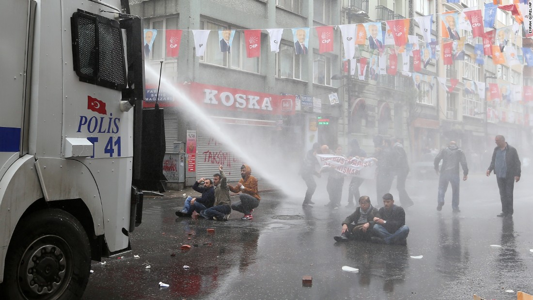 Police use water cannons on May Day demonstrators in Istanbul, Turkey, on Friday, May 1. Clashes erupted between police and protesters, who defied a government ban  on marching to Taksim Square. Rallies around the world marked &lt;a href=&quot;http://www.cnn.com/2013/09/03/world/may-day-fast-facts/index.html&quot;&gt;May Day&lt;/a&gt;, referred to as International Workers&#39; Day in many countries.