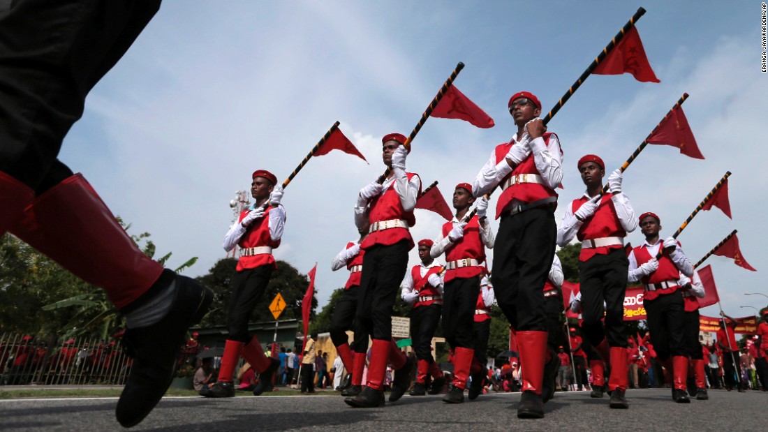Members of the Sri Lankan Marxist political party People&#39;s Liberation Front march during a rally in Colombo, Sri Lanka.