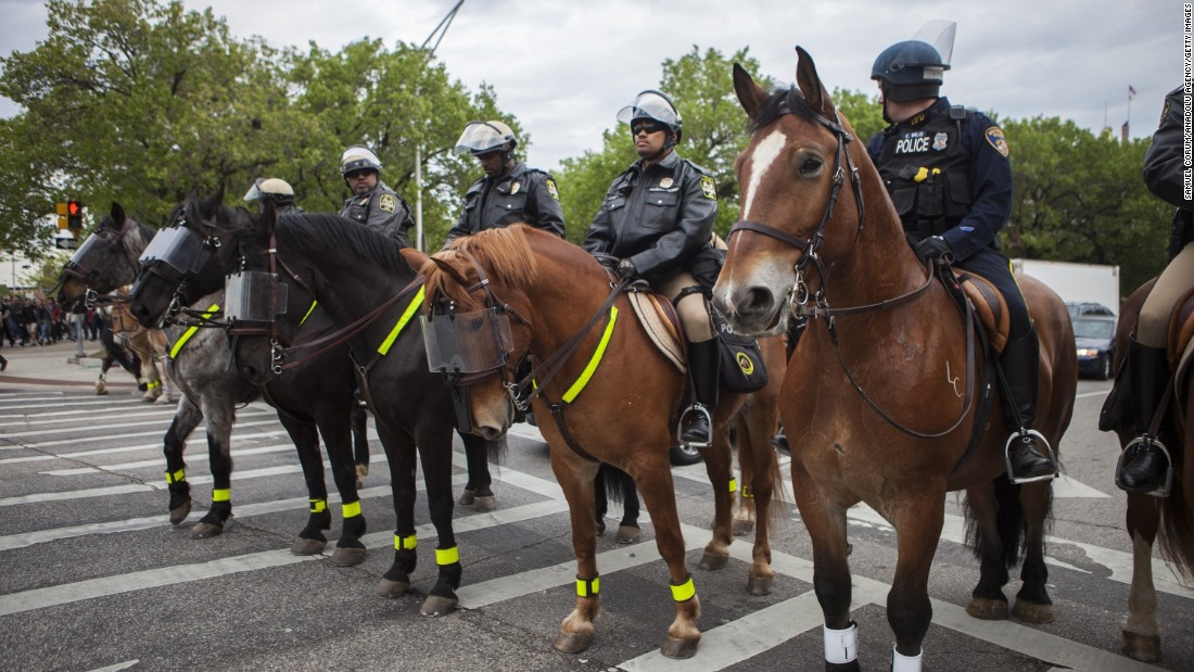 Police on horseback block a Baltimore street on May 1.