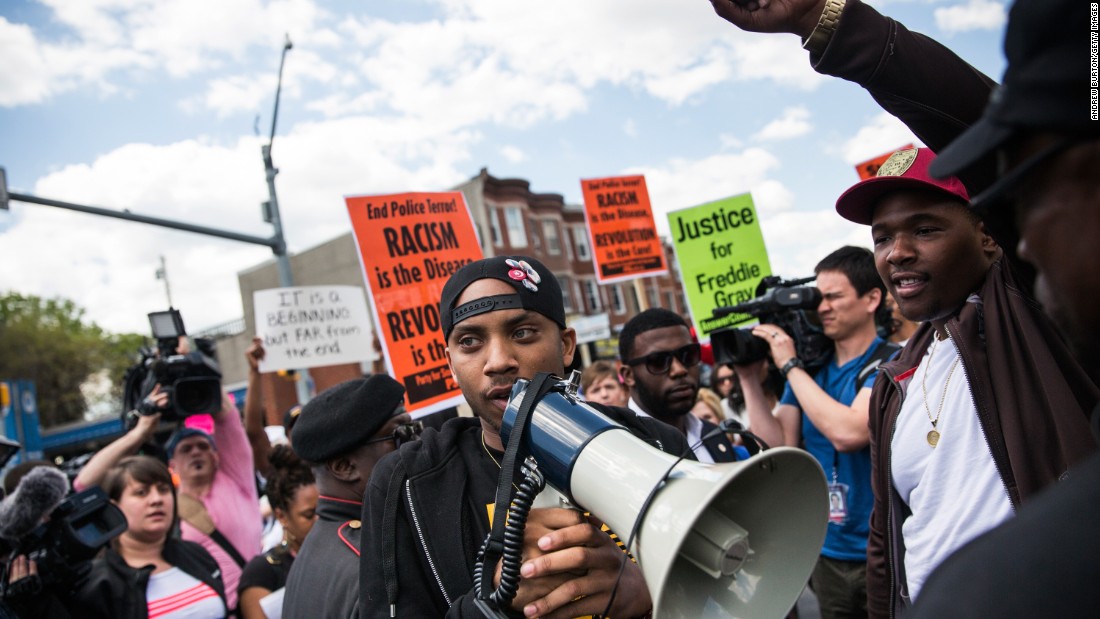 Protesters march from the Gilmor Homes housing community, where Freddie Gray was arrested, to City Hall on Saturday, May 2, in Baltimore. 