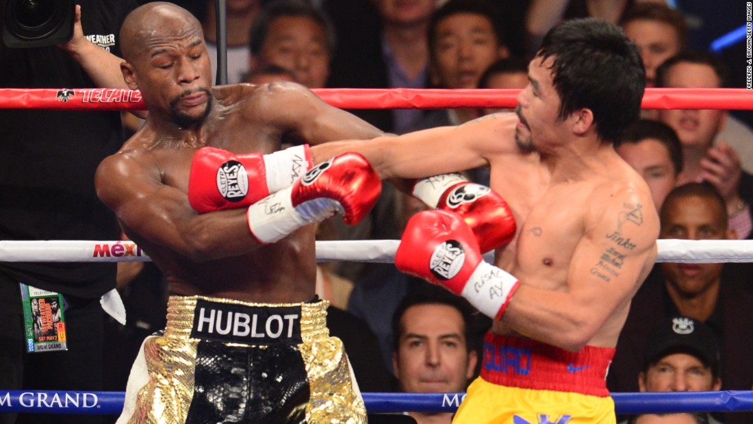 Floyd Mayweather and Manny Pacquiao go toe to toe. 