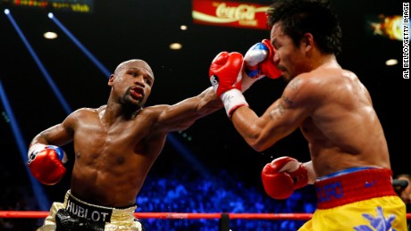 Floyd Mayweather Jr. throws a left at Manny Pacquiao. 