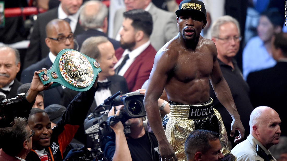 Floyd Mayweather won the World Boxing Organization&#39;s title and retained the World Boxing Association and World Boxing Council belts. 