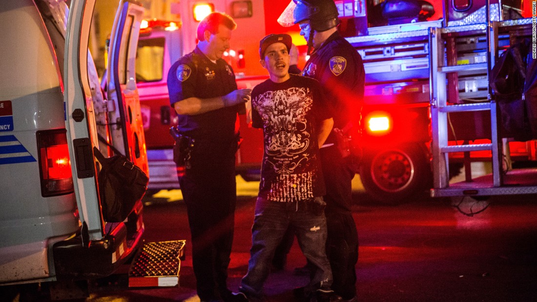 Police detain a man on May 2 in Baltimore&#39;s Sandtown neighborhood.