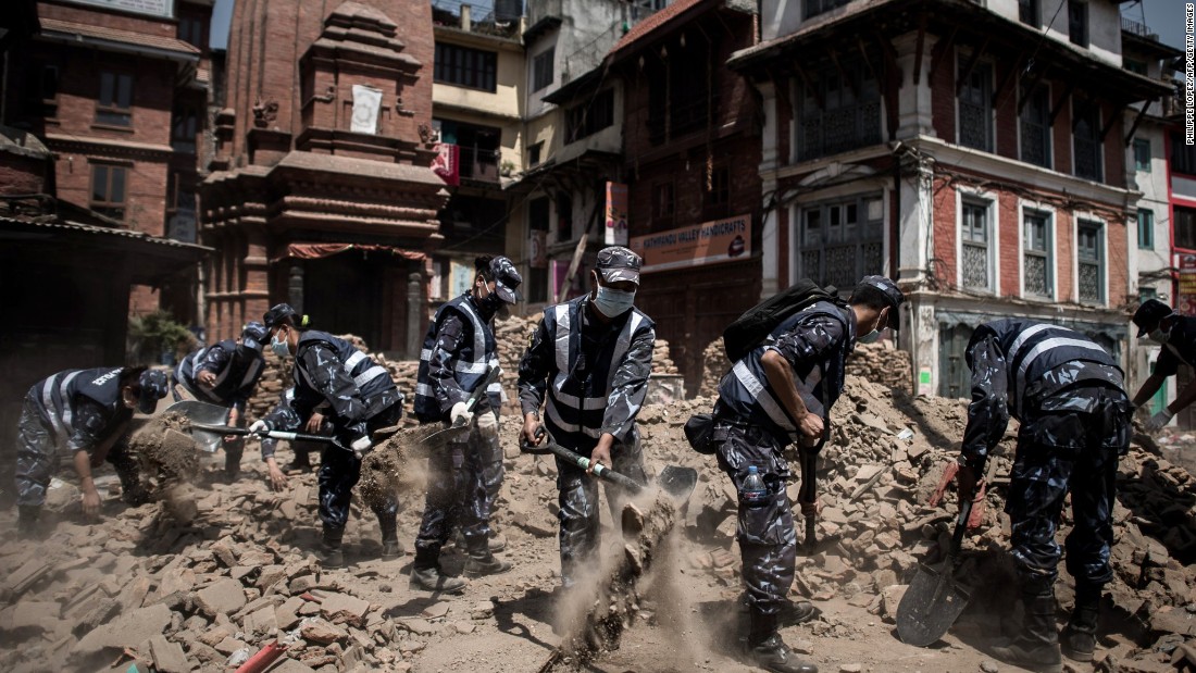 Nepalese police officers clear debris from Durbar Square in Kathmandu on Sunday, May 3. A magnitude-7.8 earthquake centered less than 50 miles from Kathmandu &lt;a href=&quot;http://www.cnn.com/2015/04/28/asia/nepal-earthquake/index.html&quot;&gt;rocked Nepal with devastating force&lt;/a&gt; Saturday, April 25. The earthquake and its aftershocks have turned one of the world&#39;s most scenic regions into a panorama of devastation, killing and injuring thousands.