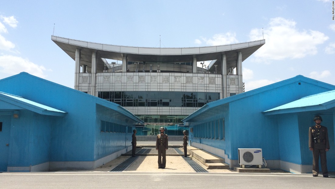 Soldiers stand guard on the North Korean side of the DMZ.