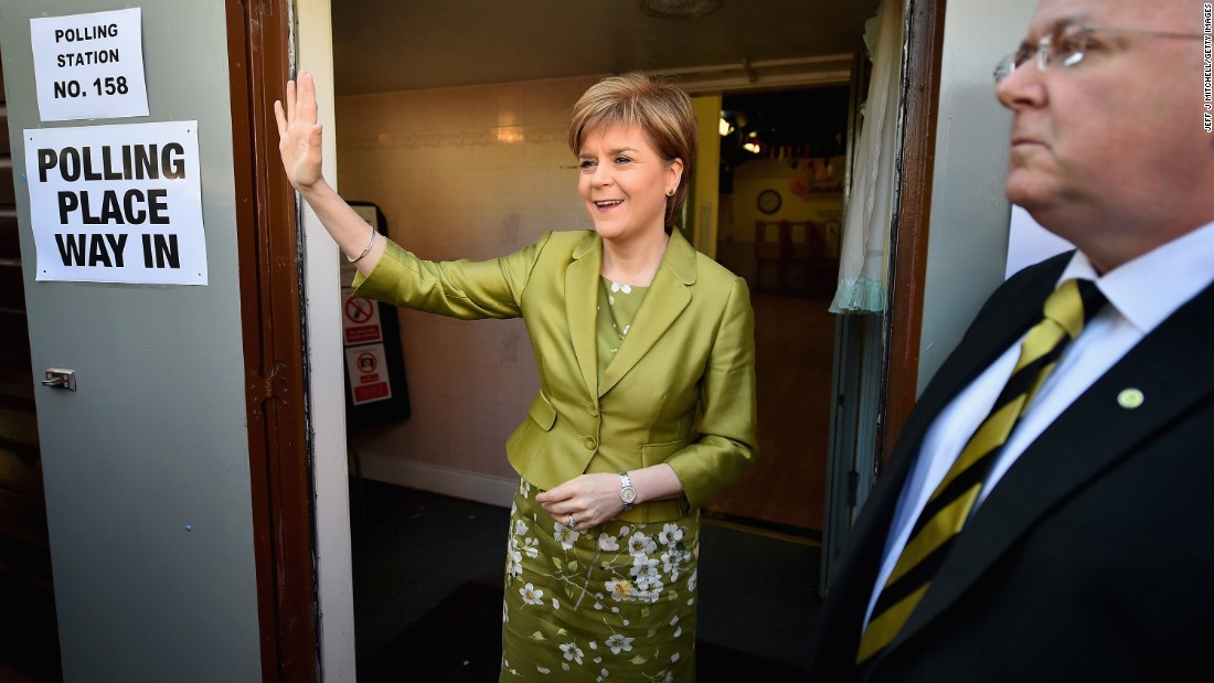 Nicola Sturgeon, first minister of Scotland and leader of the Scottish National Party, votes with her husband, Peter Murrell, in Glasgow, Scotland.