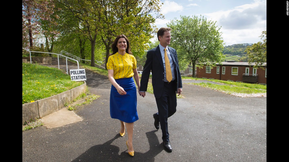 Nick Clegg, leader of the Liberal Democrats, and his wife, Miriam Gonzalez Durantez, arrive to vote at the Hall Park Centre in Sheffield, South Yorkshire, England.